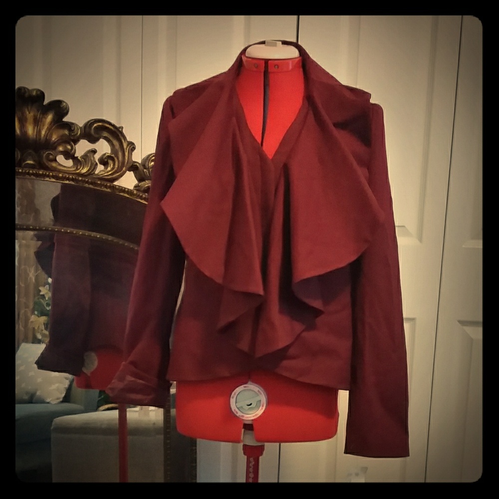 Blazer, lined with zipper closure.